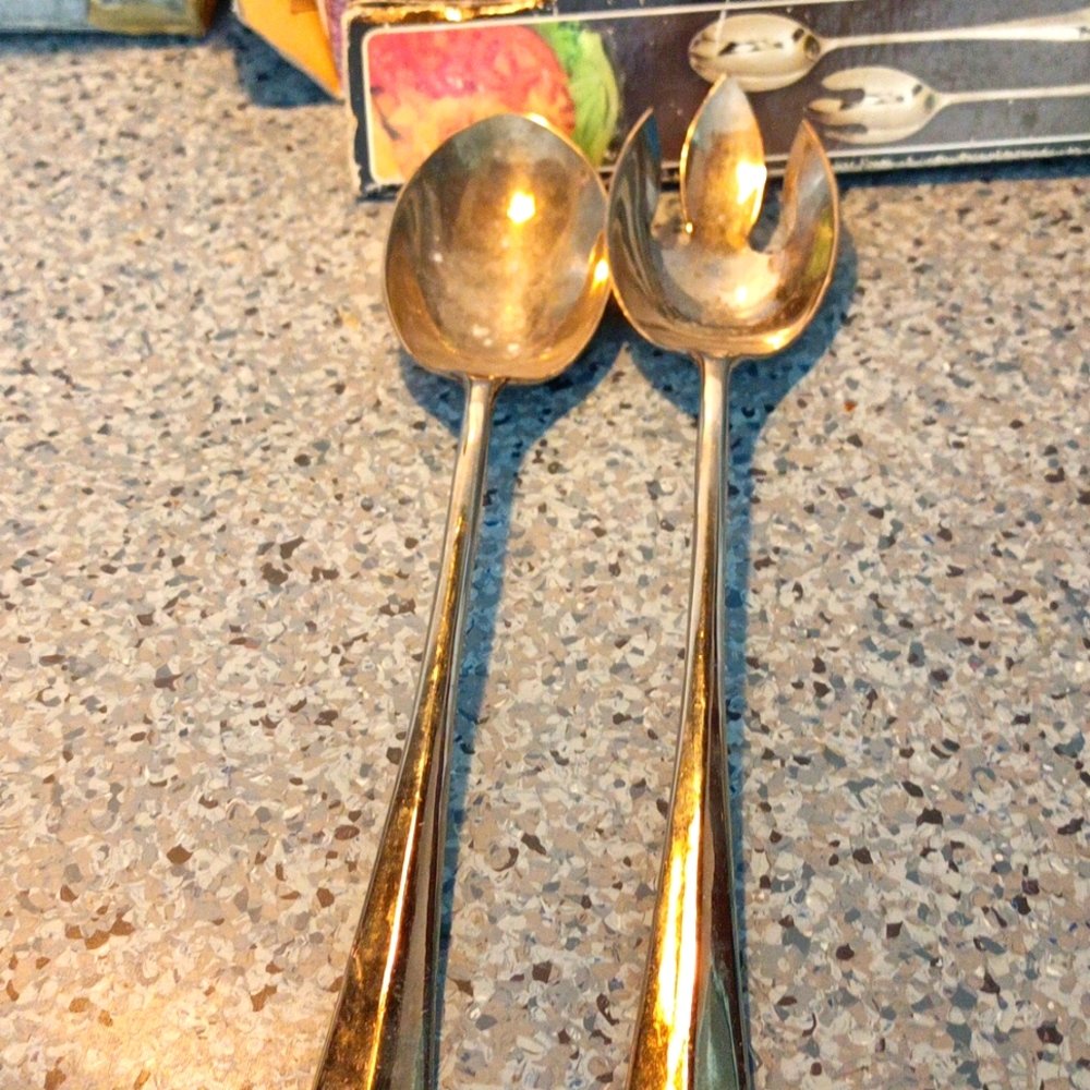 Beautiful silver plated spoon and fork set..little over 12 and half inches